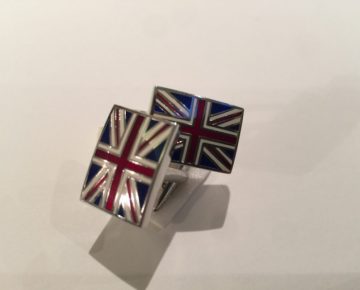 A pair of cufflinks in the form of the UK flag