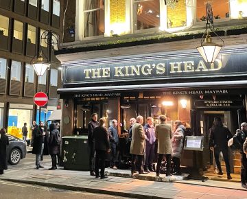 journalist drinks in a pub